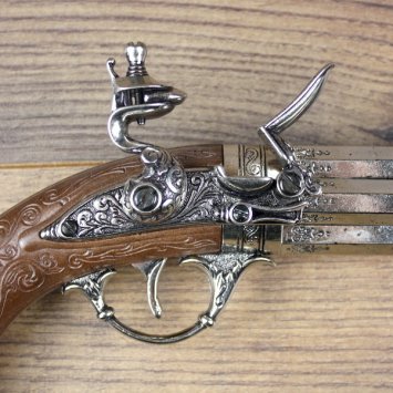 4 - Drehlauf Steinschloßpistole, mit 1 Pfanne, brauner Griff mit Vogelkopf, Grau - Replik
