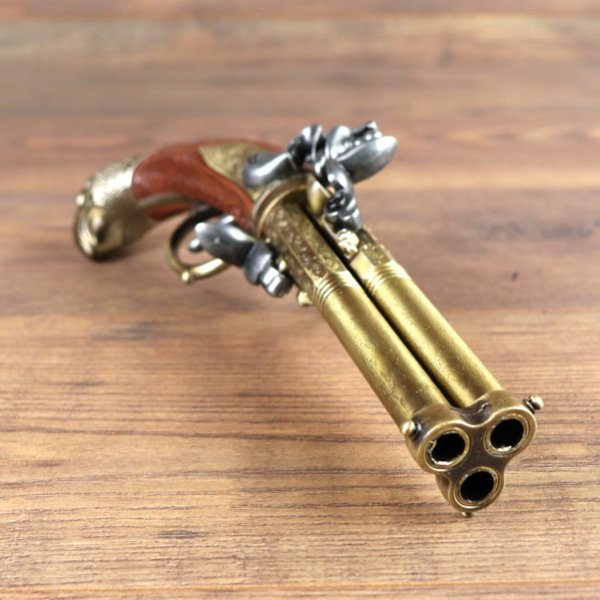 3 - Drehlauf Steinschloß Pistole mit 3 Pfannen, brauner Griff mit Vogelkopf, Messing - Replik