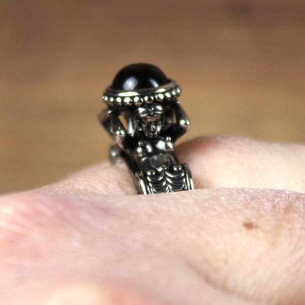 Ring with man and woman in antique style and red hemisphere stone