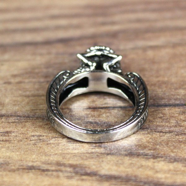 Ring with man and woman in antique style and red hemisphere stone