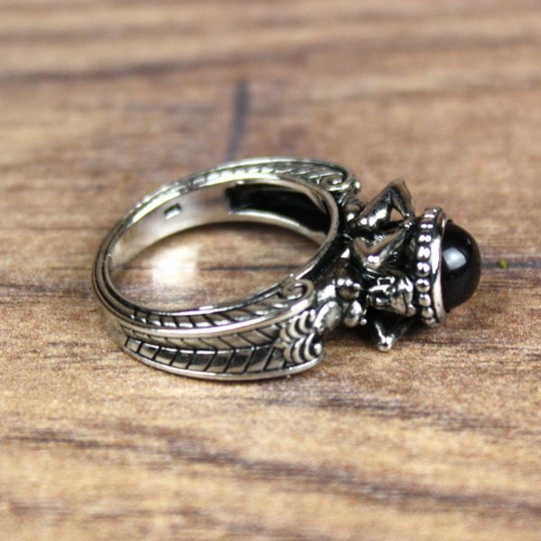 Ring with man and woman in antique style and red hemisphere stone