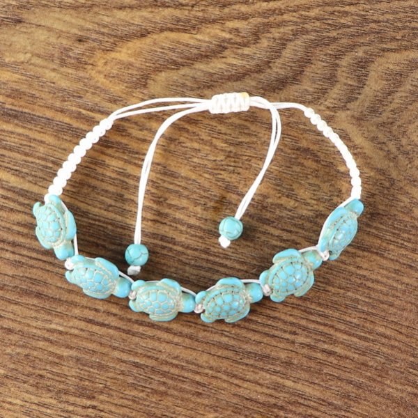 Armband 6 türkise Schildkröten, weißes Band